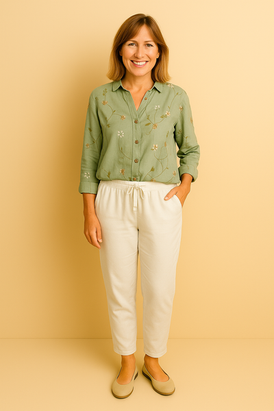 Liora™ | Graceful blouse with whimsical patterns